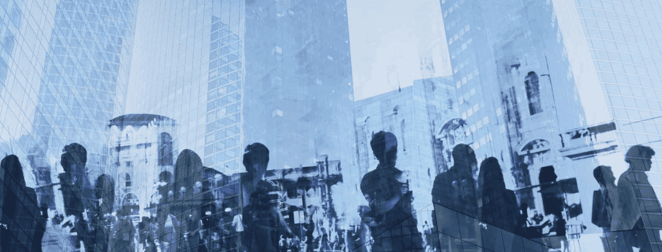 Silhouettes of professionals walking through a financial district, symbolizing career opportunities after passing the SIE Exam