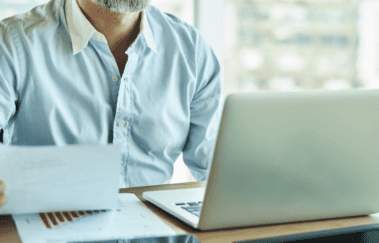 New financial professional engaging in a structured training program to prepare for securities licensing exams and pass the SIE exam on the first attempt