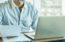 New financial professional engaging in a structured training program to prepare for securities licensing exams and pass the SIE exam on the first attempt